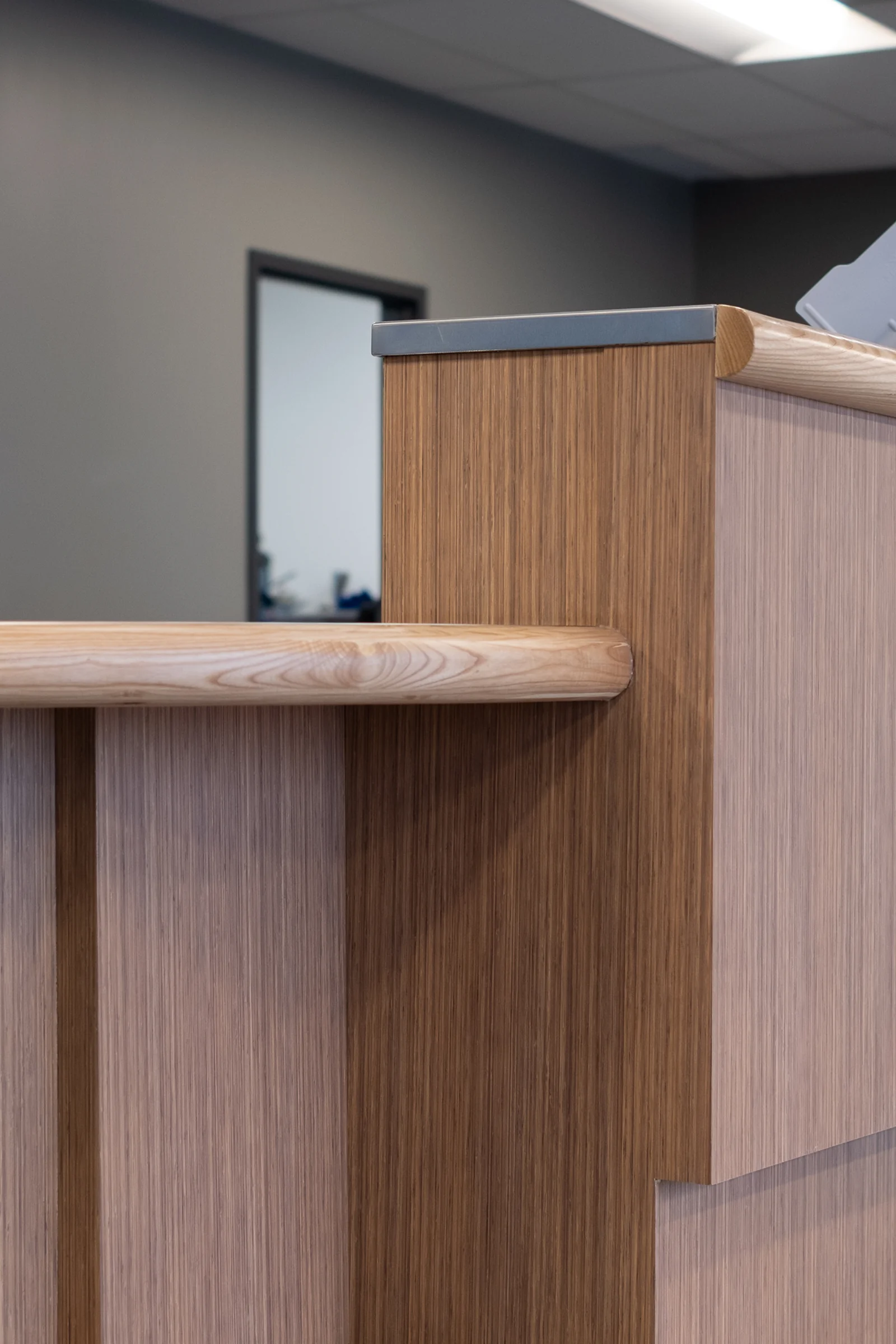 Wood grain desk detail with layered tones