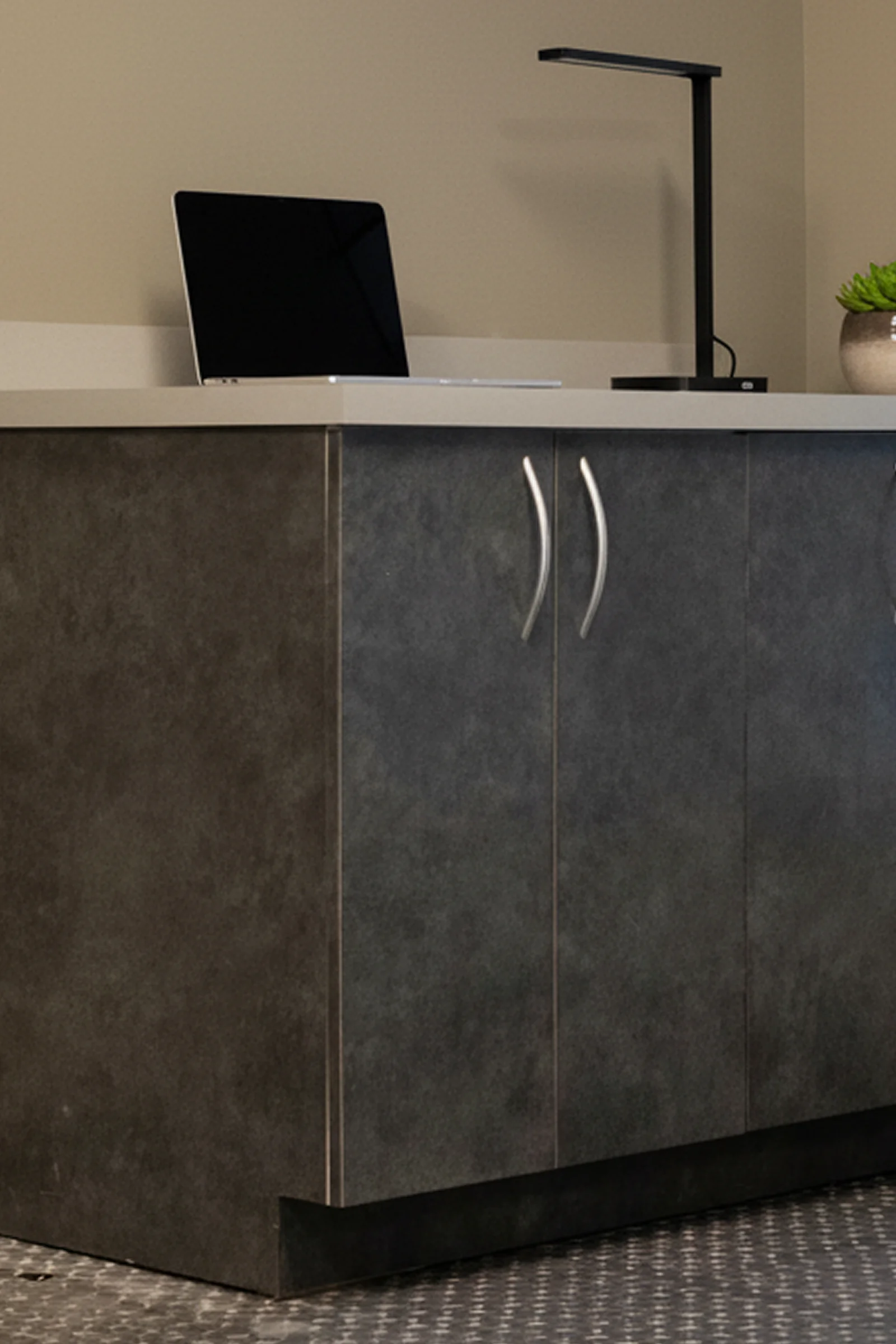 Dark cabinet workstation with light countertop