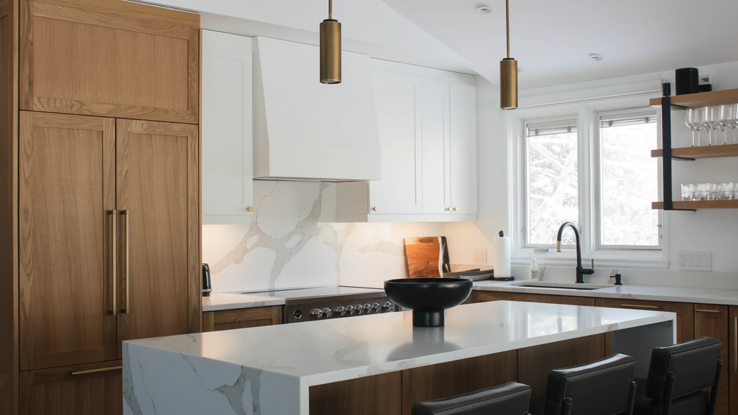 Kitchen island with marble countertop and range area