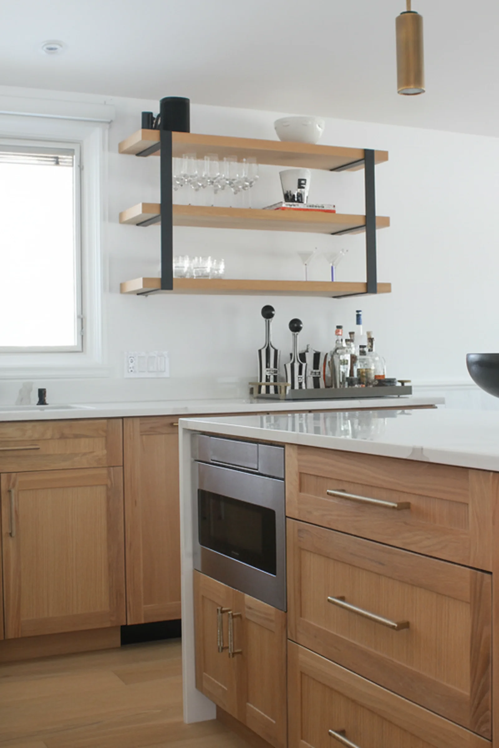 Open shelving and bar area with marble countertop