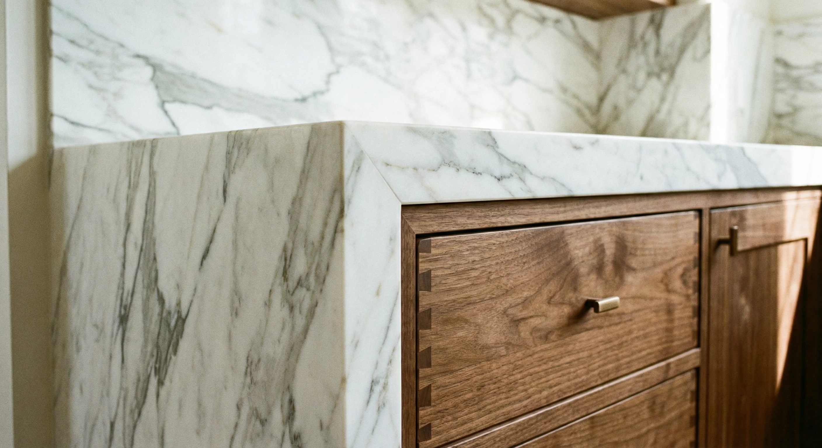 Marble and walnut cabinet detail